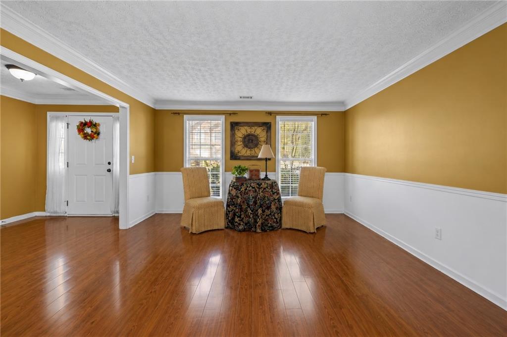 2760 Rusticwood Drive Southwest Snellville, GA 30078 - Photo 4 of 50 a living room with furniture and wooden floor