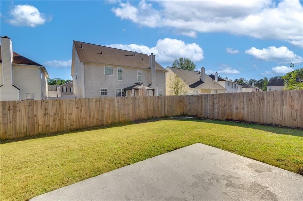 2760 Rusticwood Drive Southwest Snellville, GA 30078 - Photo 45 of 50 a view of a backyard