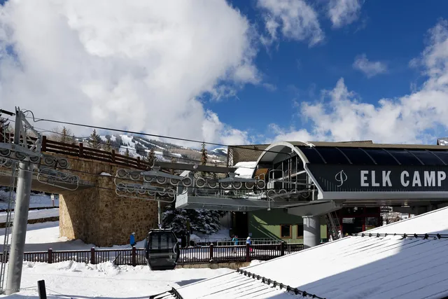 a view of a balcony with furniture and stove