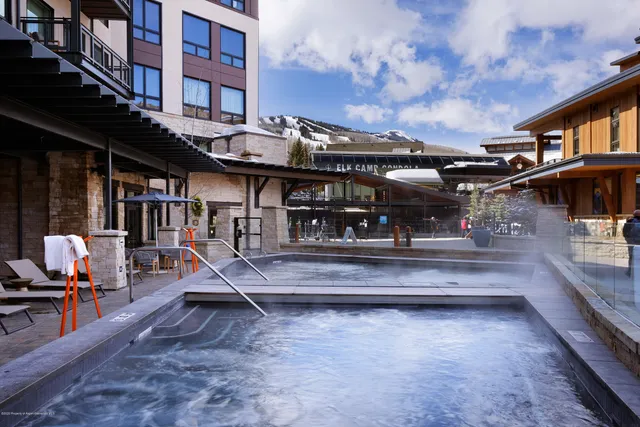 a view of a building with sitting area