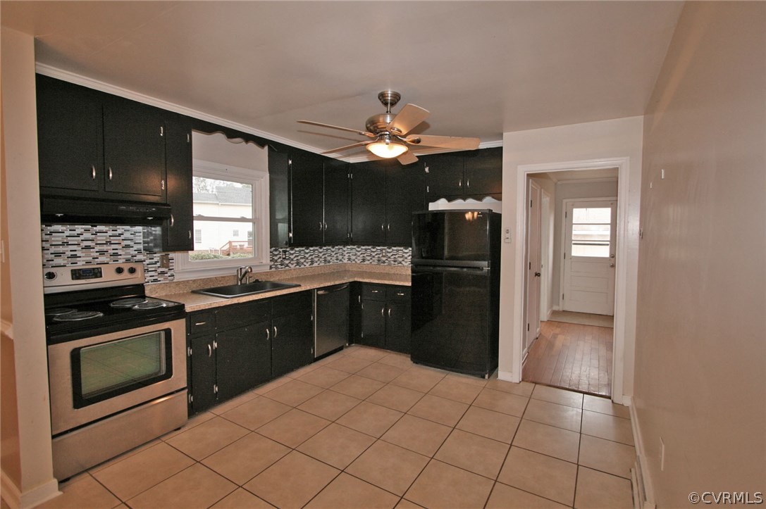 3500 Respess Road Midlothian, VA 23112 - Photo 4 of 16 a kitchen with stainless steel appliances granite countertop a refrigerator and a sink