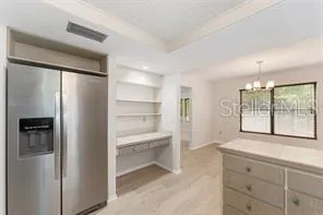 a large white room with a large window
