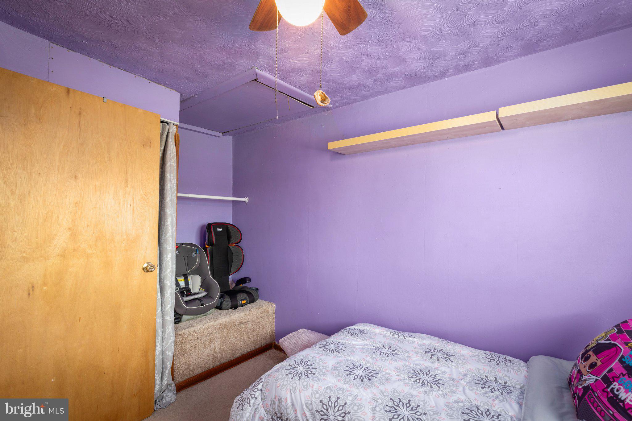 7404 Edsworth Road Dundalk, MD 21222 - Photo 17 of 24 a bedroom with pink walls