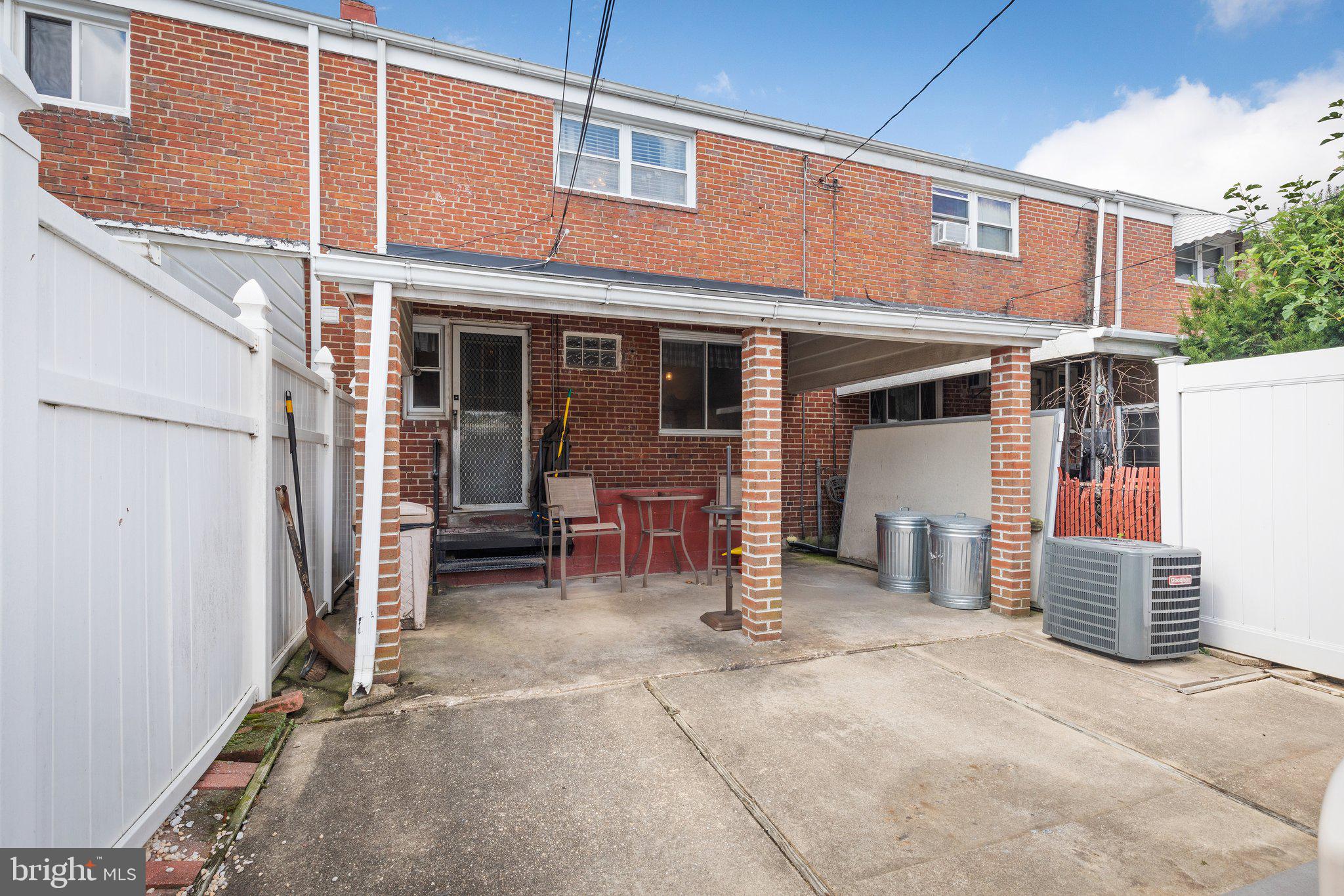 7404 Edsworth Road Dundalk, MD 21222 - Photo 23 of 24 a view of a house with patio