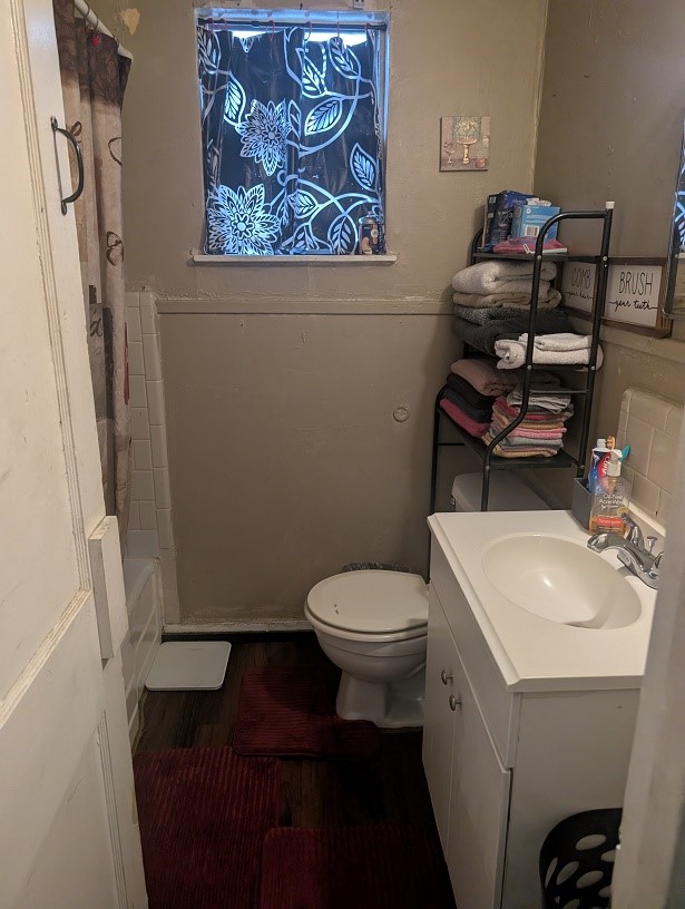 3626 Corder Street Houston, TX 77021 - Photo 3 of 6 a bathroom with a toilet a sink and vanity