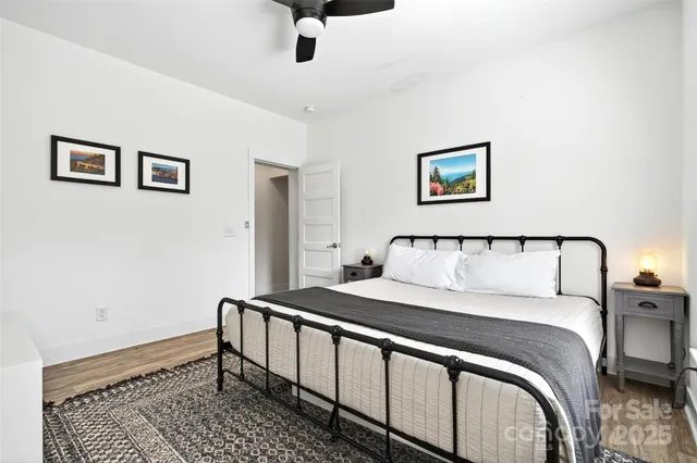 a large white bed in a white room