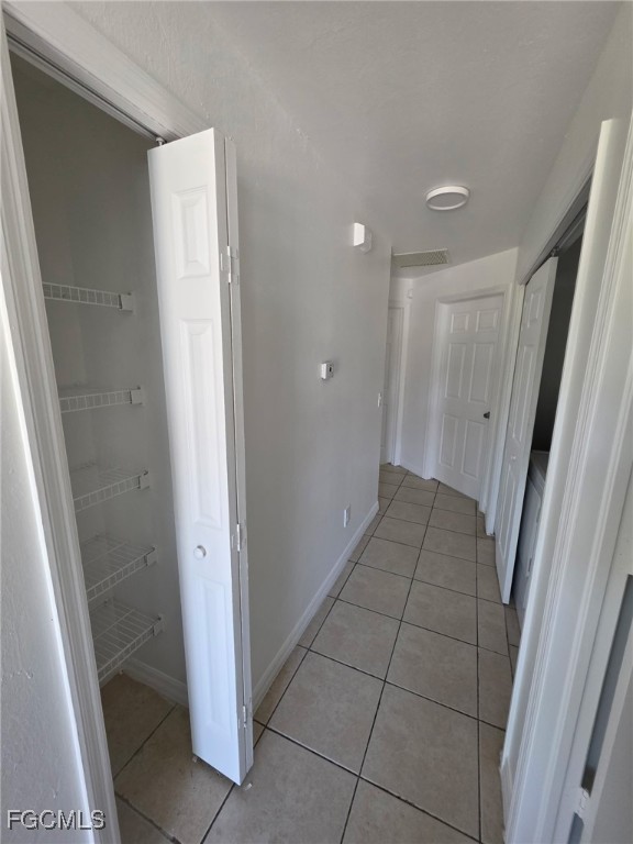 1248 Columbus Boulevard, Unit B Fort Myers, FL 33913 - Photo 1 of 16 a view of a hallway