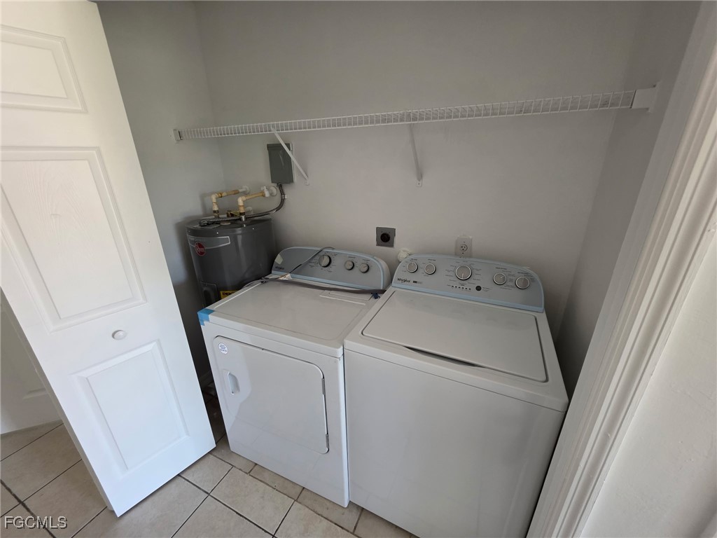 1248 Columbus Boulevard, Unit B Fort Myers, FL 33913 - Photo 16 of 16 a utility room with dryer and washer