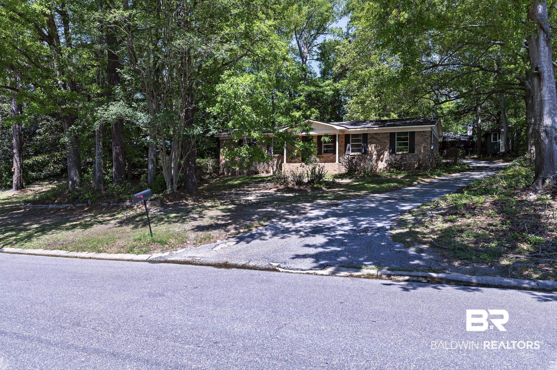 707 Johnson Avenue Fairhope, AL 36532 - Photo 6 of 38 View of front of property with aphalt driveway