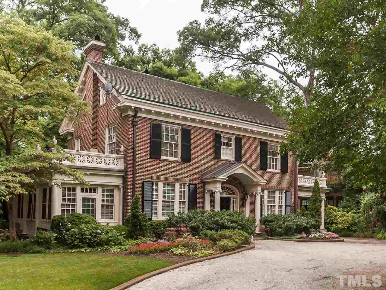 1553 Carr Raleigh, NC 27608 - Photo 1 of 25 a front view of a house with garden