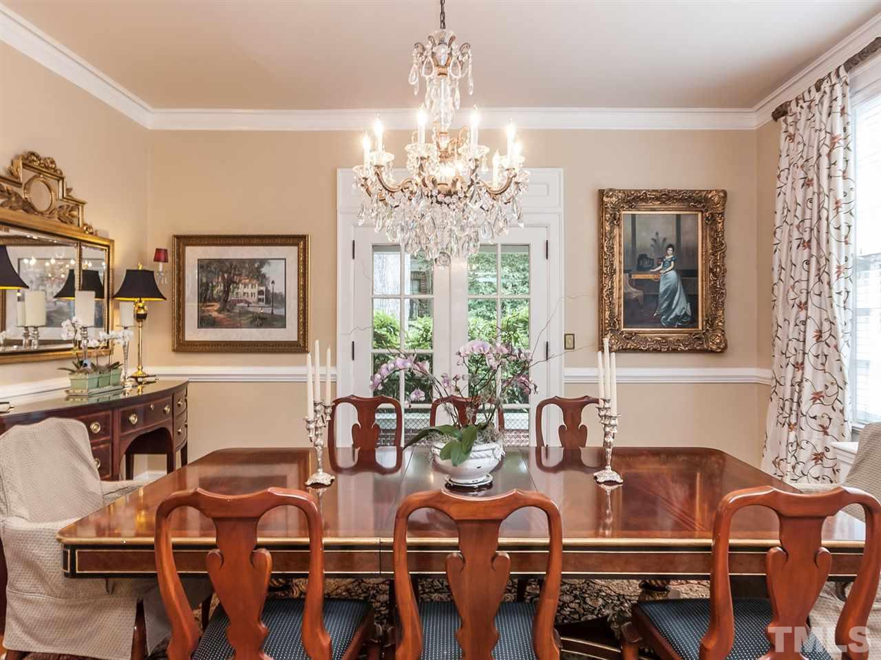 1553 Carr Raleigh, NC 27608 - Photo 3 of 25 a view of a dining room with furniture window and outside view