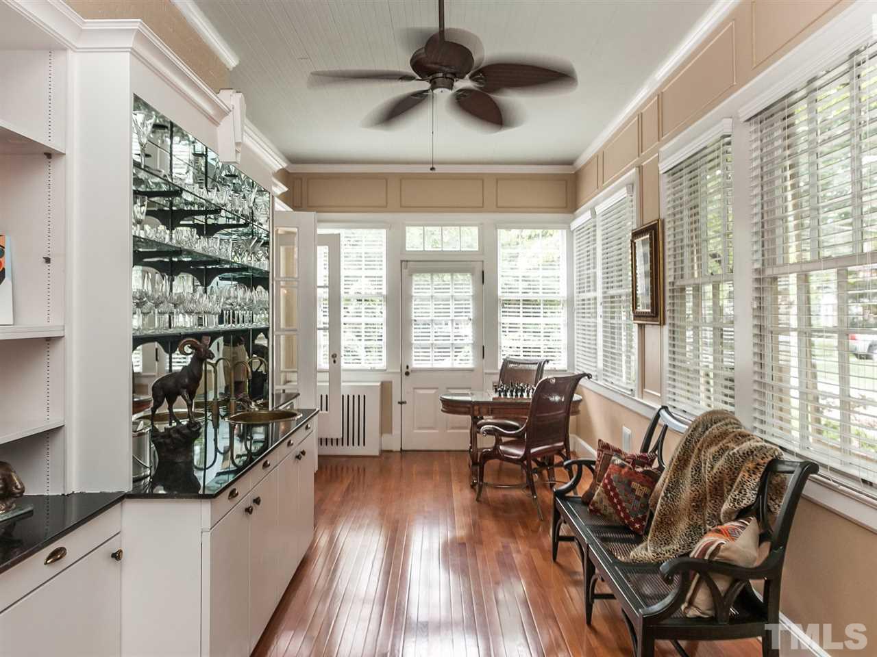 1553 Carr Raleigh, NC 27608 - Photo 6 of 25 a living room with furniture and a large window