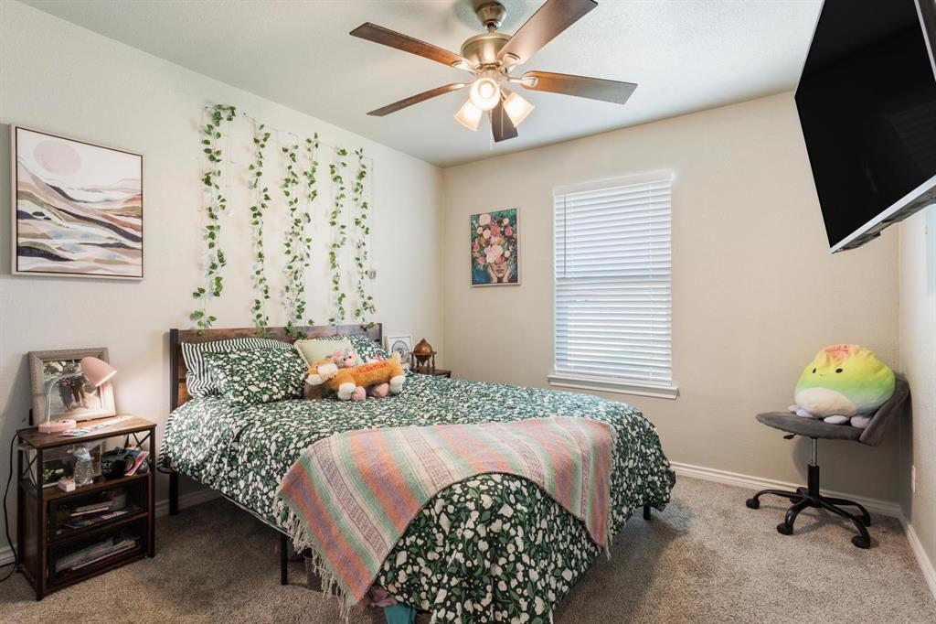 8876 1237 Spur Troy, TX 76579 - Photo 21 of 31 a bedroom with bed and a window
