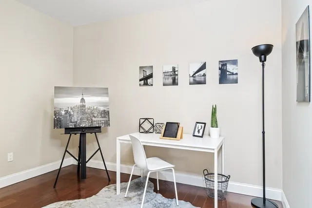 a view of a workspace with furniture