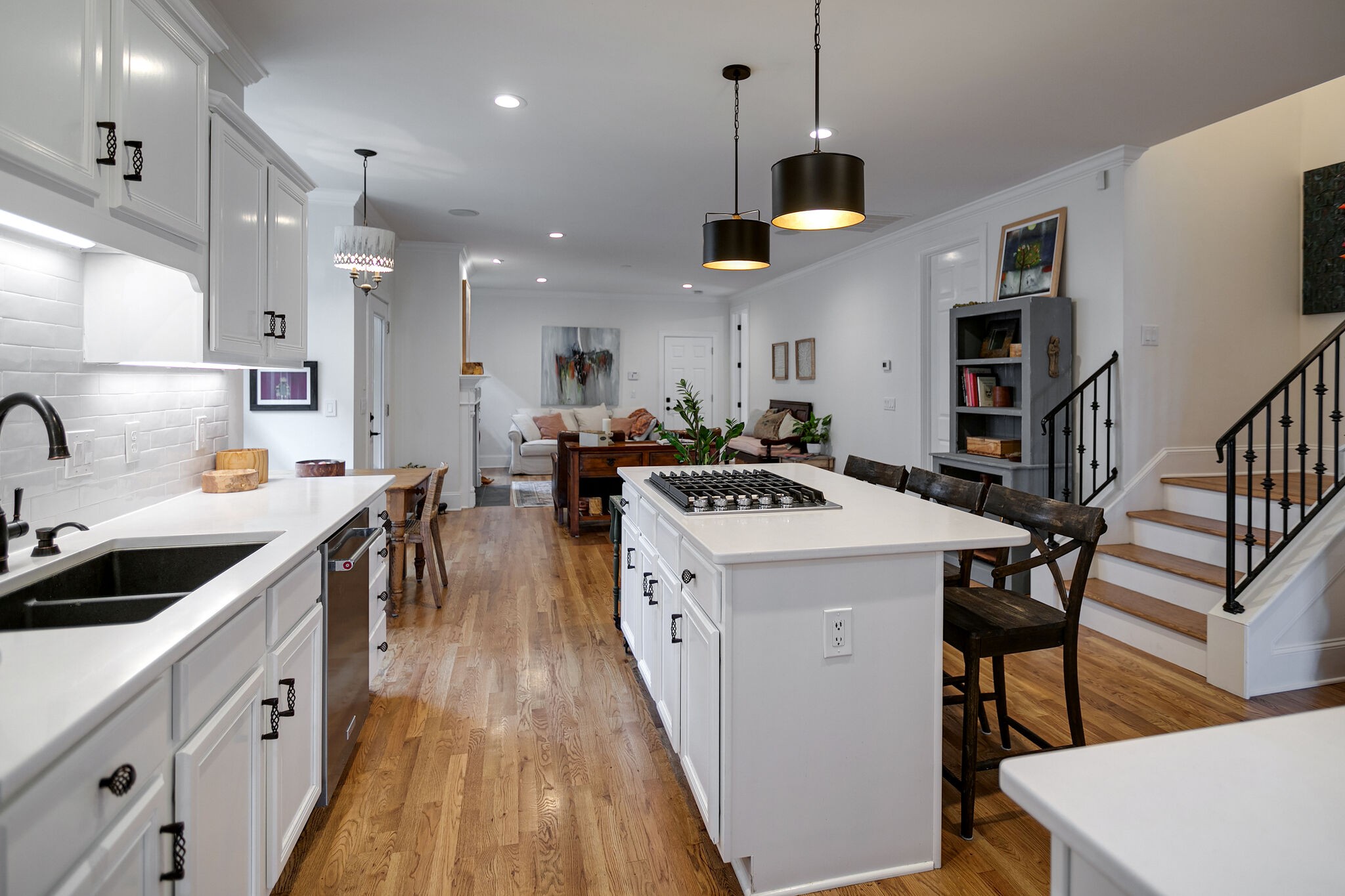 126 Addison Avenue Franklin, TN 37064 - Photo 20 of 38 a kitchen that has a lot of cabinets a sink and wooden floor