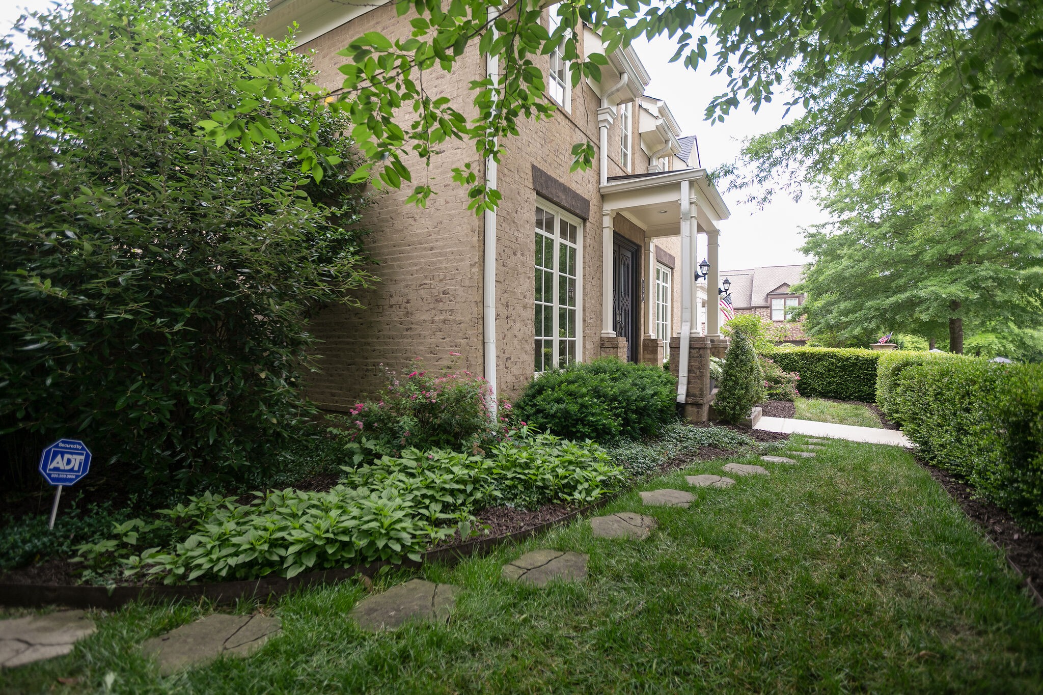 126 Addison Avenue Franklin, TN 37064 - Photo 2 of 38 a front view of a house with garden