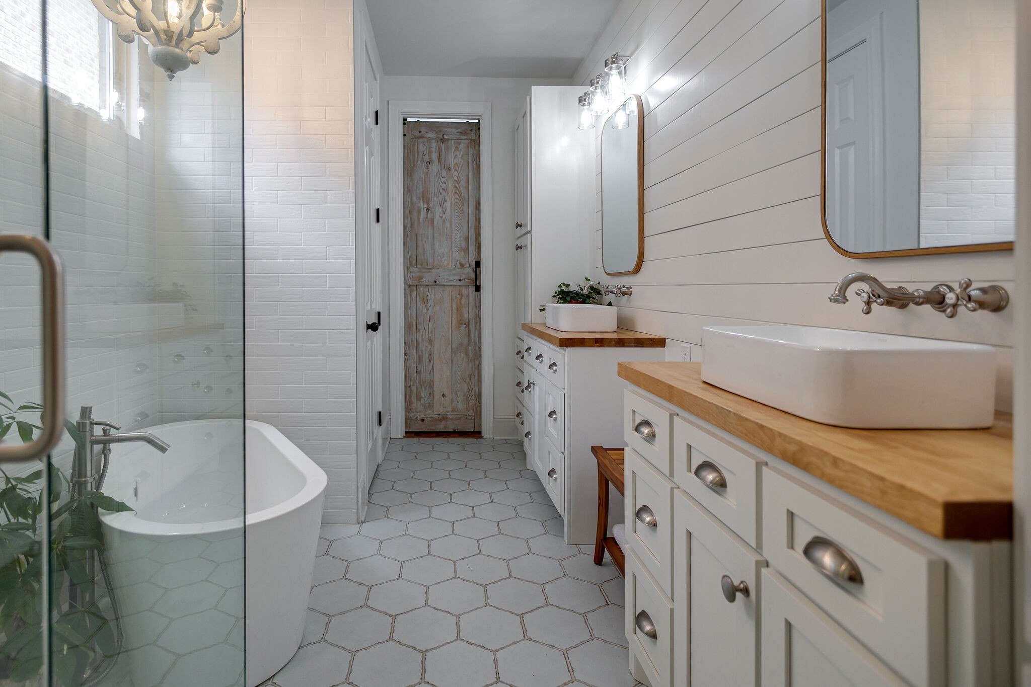 126 Addison Avenue Franklin, TN 37064 - Photo 23 of 38 a spacious bathroom with a tub sink and mirror