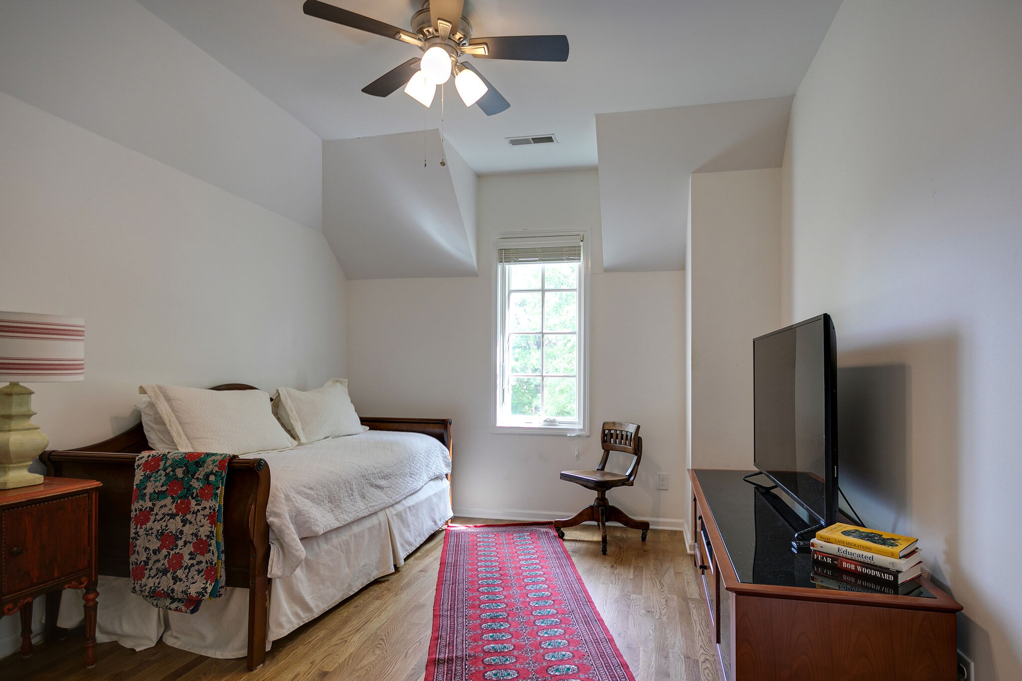 126 Addison Avenue Franklin, TN 37064 - Photo 32 of 38 a bedroom with a bed and a flat screen tv