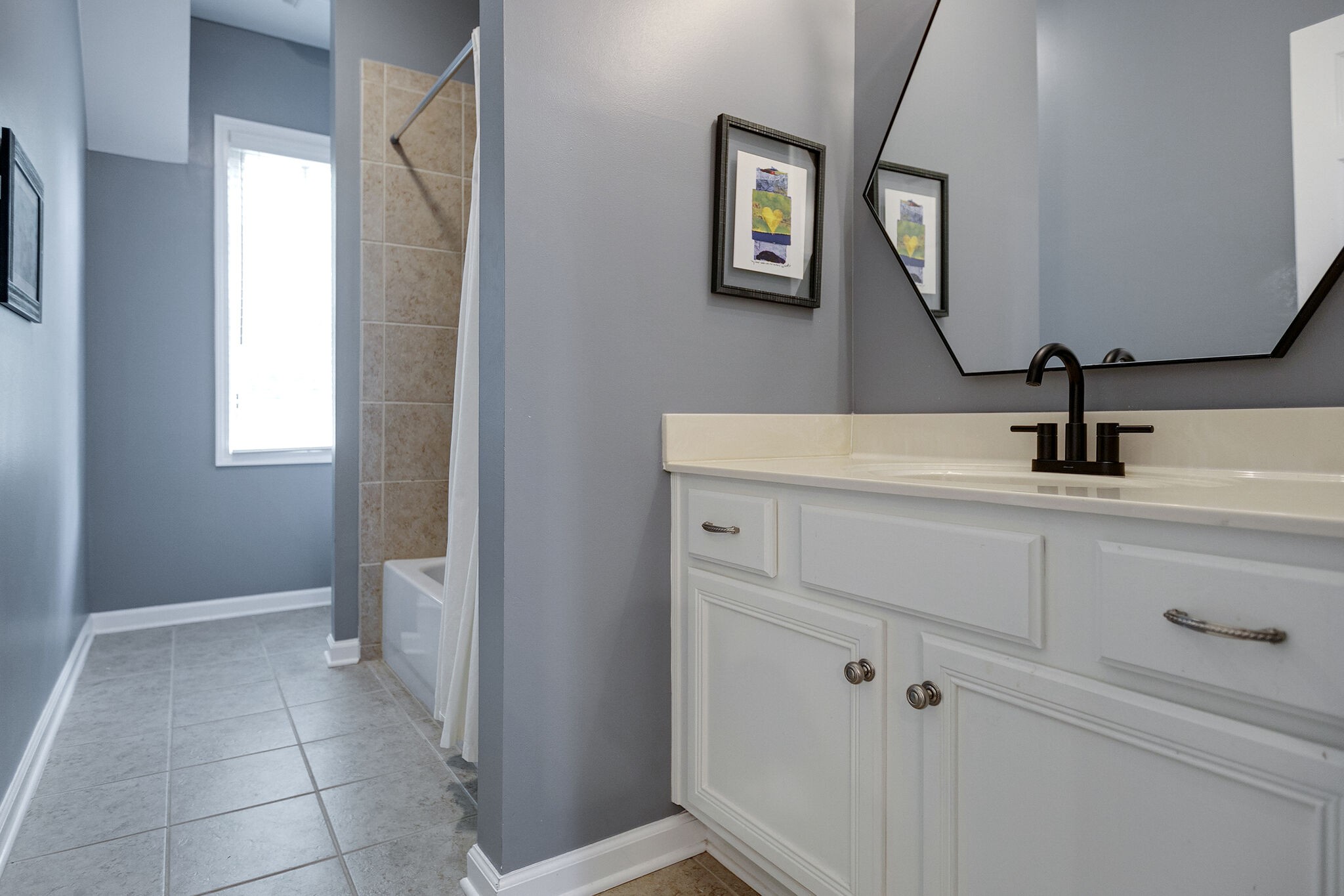126 Addison Avenue Franklin, TN 37064 - Photo 34 of 38 a bathroom with a sink and a mirror