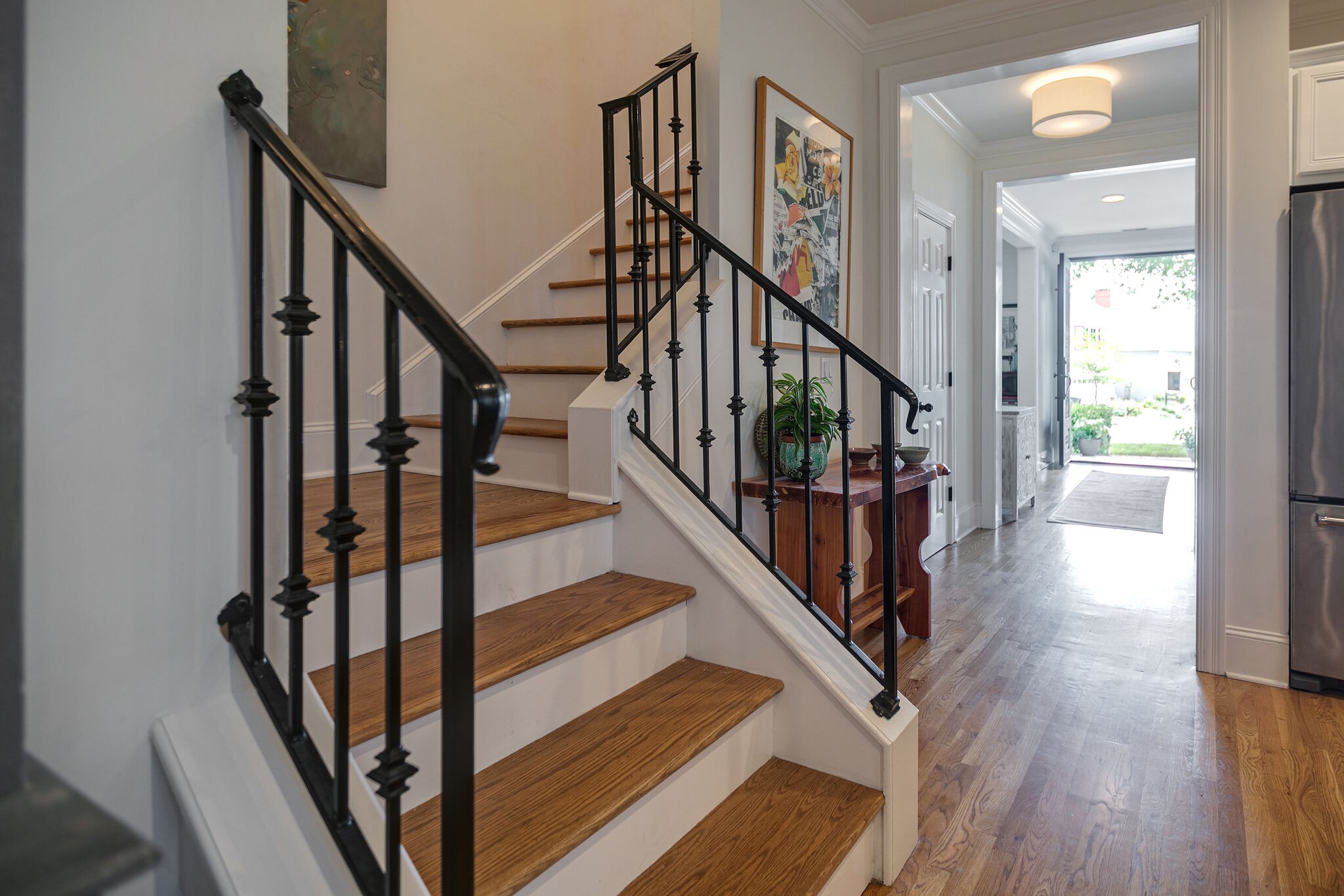 126 Addison Avenue Franklin, TN 37064 - Photo 4 of 38 a view of staircase with wooden floor and white walls
