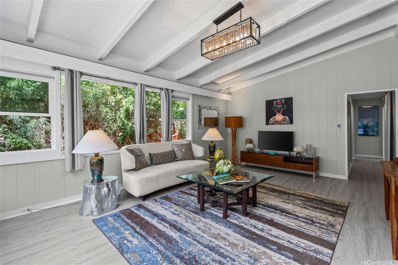 a living room with furniture and a table