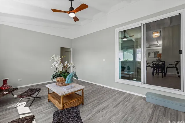 a living room with furniture and a window