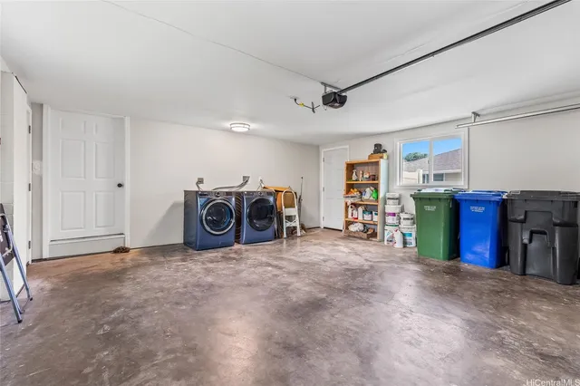 a view of a storage & utility room with a sink