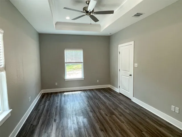 a bathroom with a granite countertop sink double and mirror