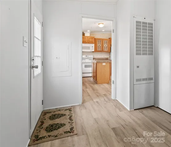 a view of kitchen and utility room