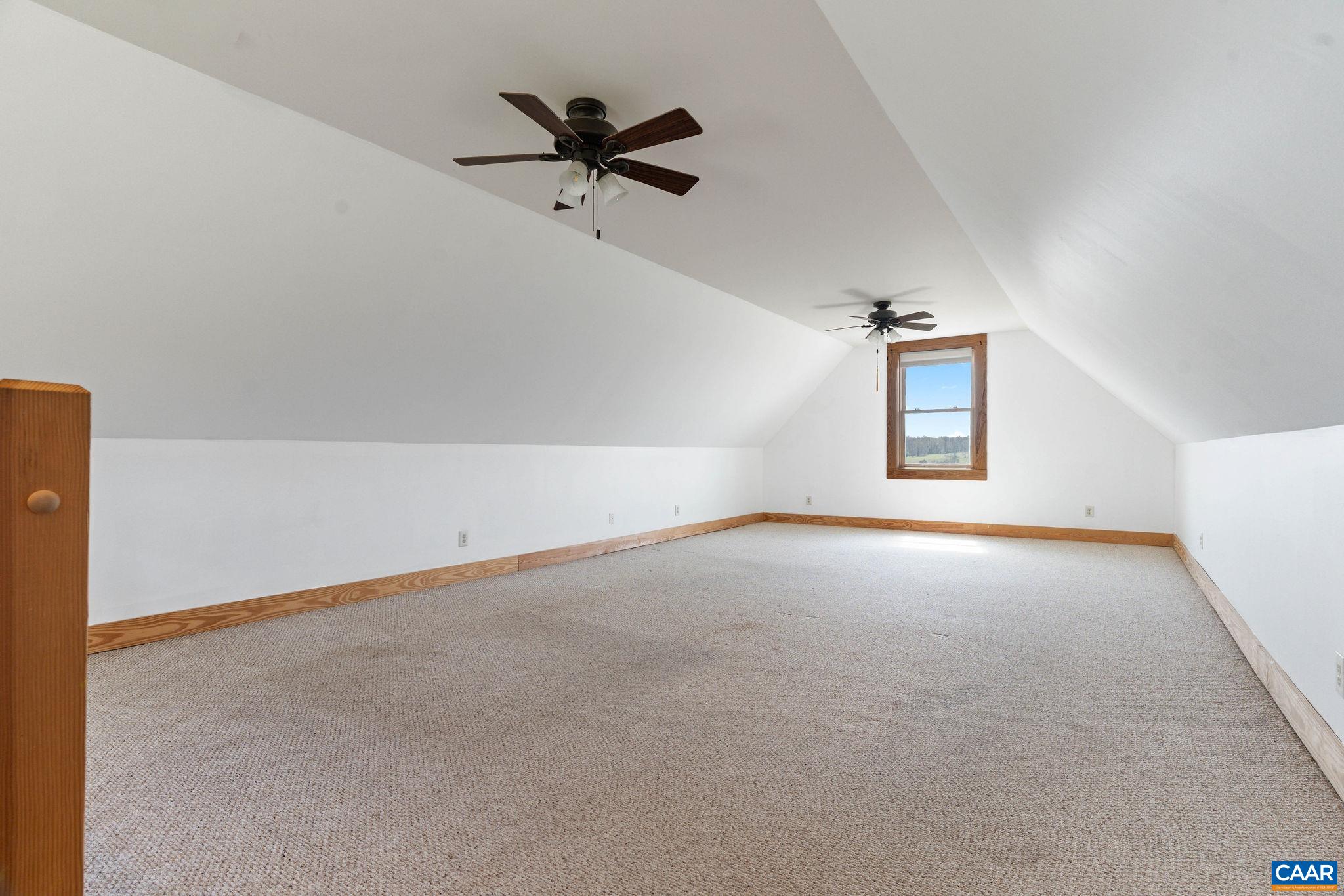 42 River Ridge Lane Stanardsville, VA 22973 - Photo 49 of 70 an empty room with a empty space and windows