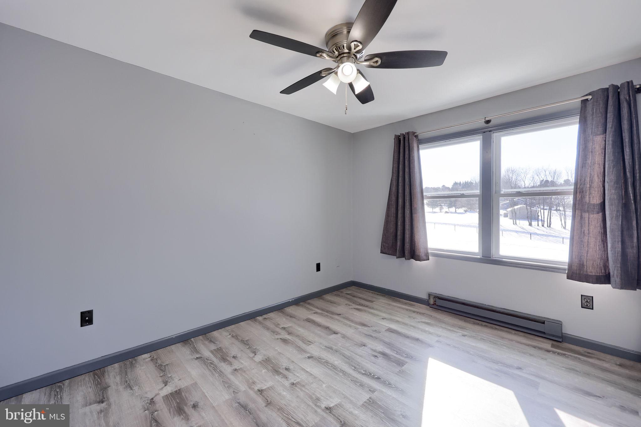 877 Richmond Road Windsor, PA 17366 - Photo 23 of 40 a view of an empty room with a window