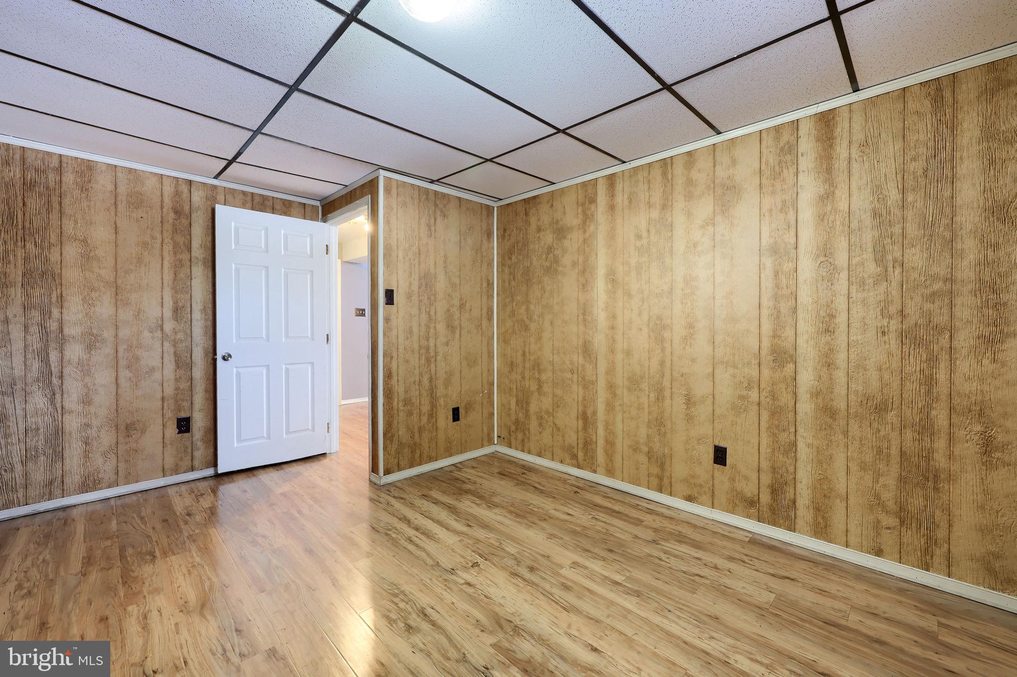 877 Richmond Road Windsor, PA 17366 - Photo 29 of 40 a view of an empty room with wooden floor