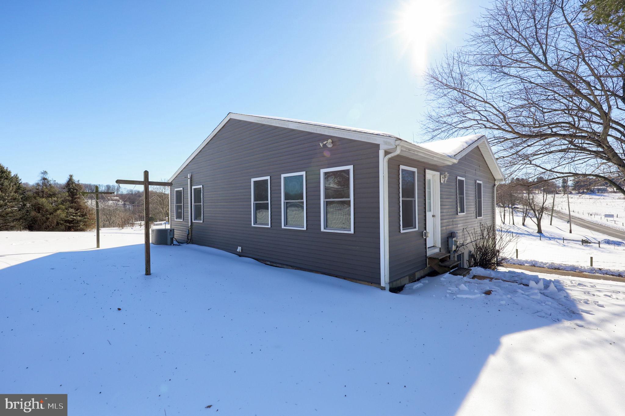877 Richmond Road Windsor, PA 17366 - Photo 34 of 40 a view of a house with a yard