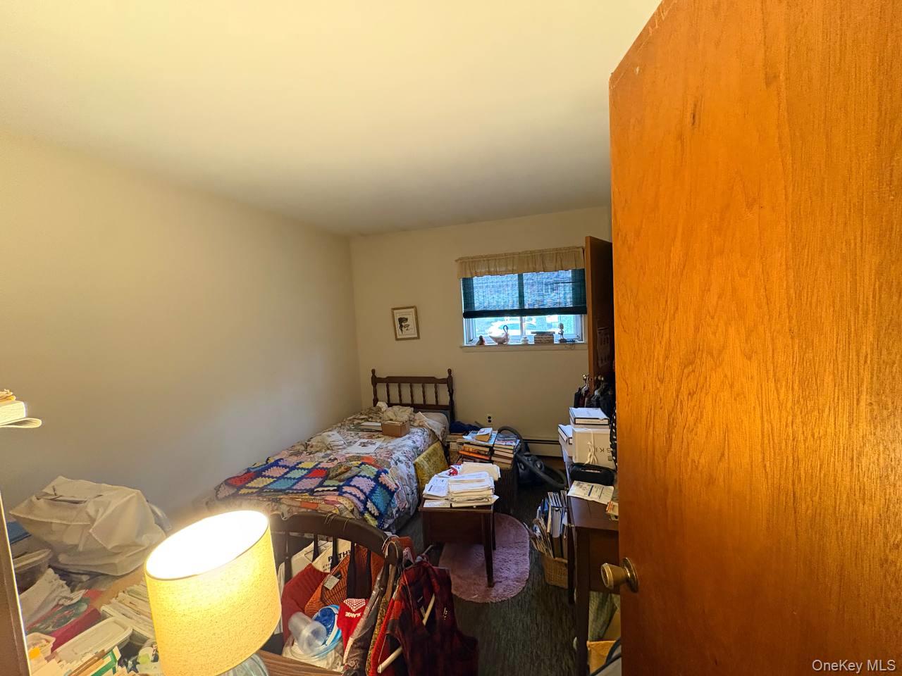 66 40th Street Islip, NY 11751 - Photo 7 of 12 a view of a bedroom with a bed and toys