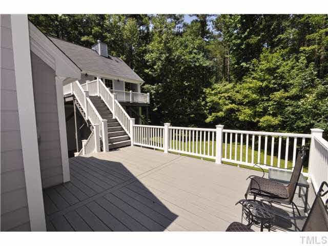 4209 White Chapel Way Raleigh, NC 27615 - Photo 20 of 25 The main house deck is reminiscent of large beach houses on the coast! Enjoy cool summer evenings with friends while watching the fireflies!