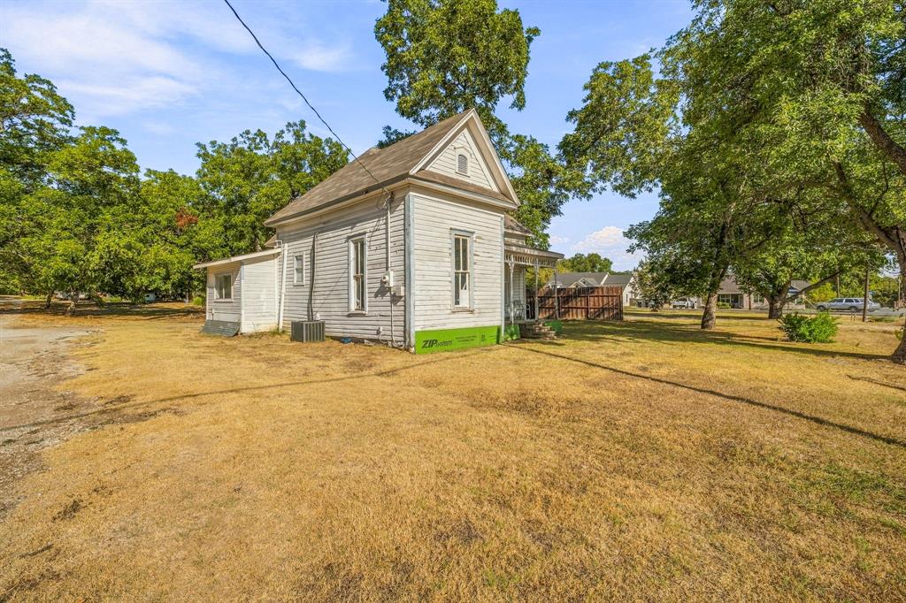 208 South Harrison Street Pilot Point, TX 76258 - Photo 2 of 21 View from Autrey Alley and Harrison St.