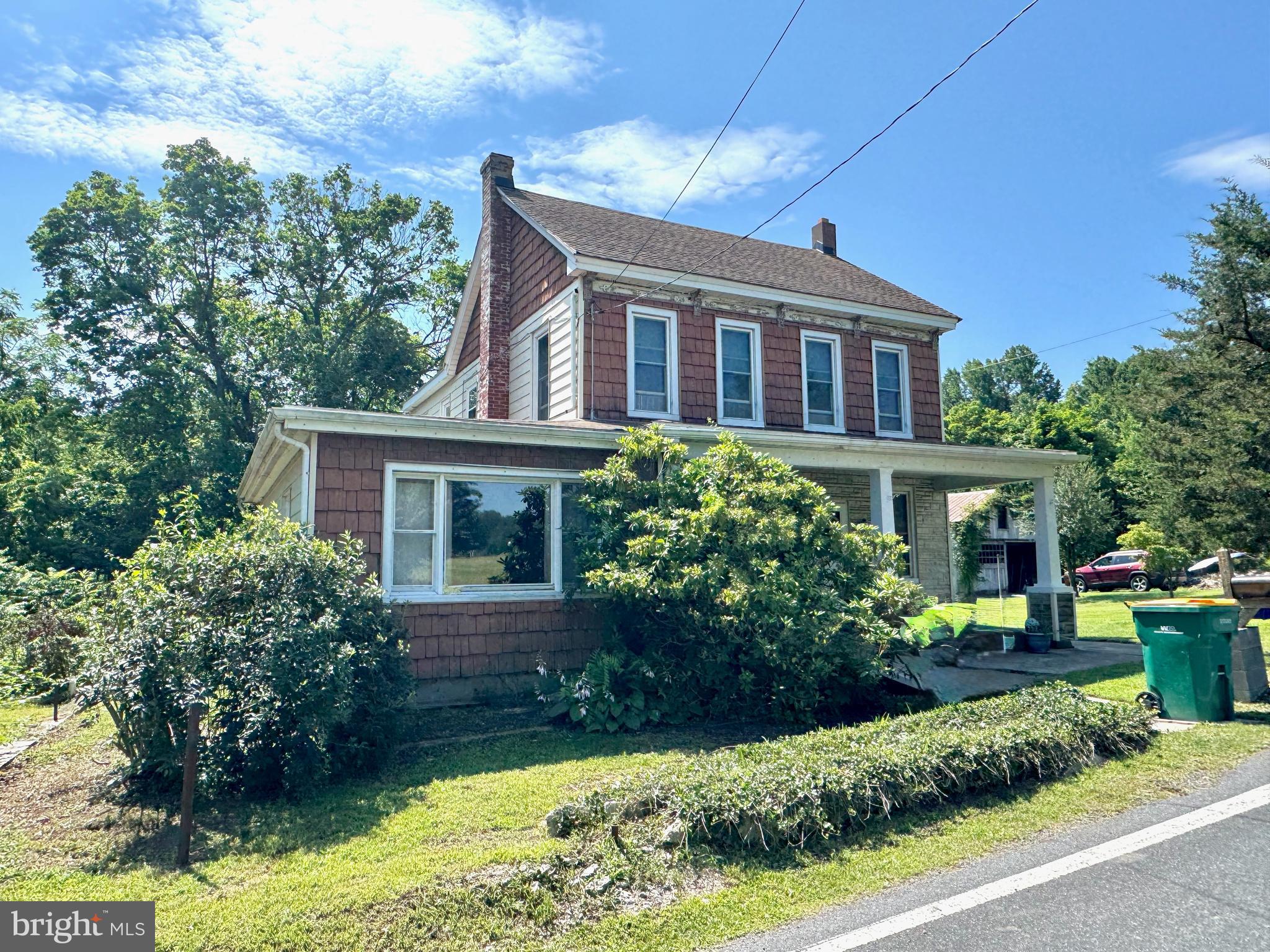 722 Mohns Hill Road Reading, PA 19608 - Photo 2 of 46 a front view of house with yard and green space