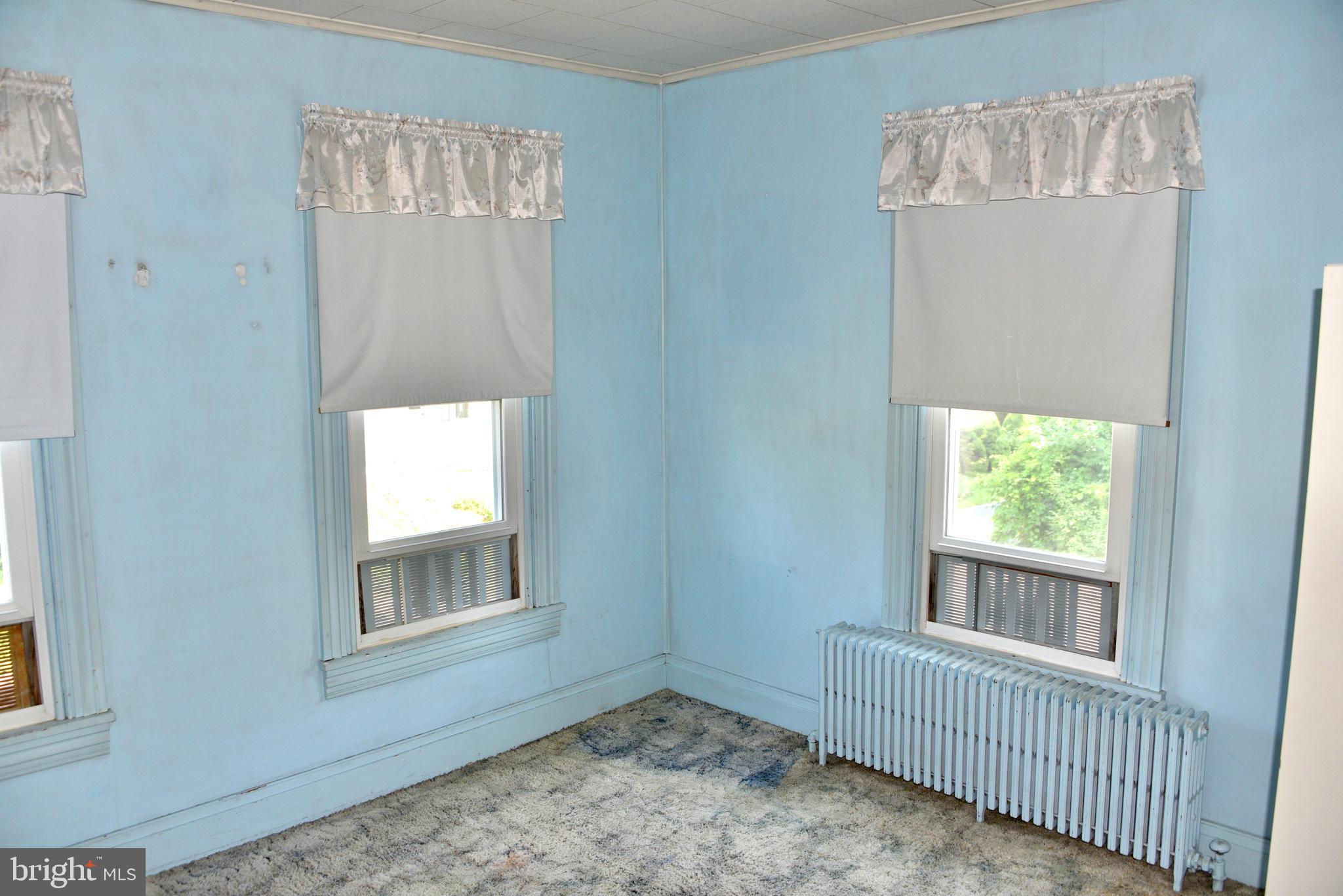 722 Mohns Hill Road Reading, PA 19608 - Photo 24 of 46 a view of an empty room with a window