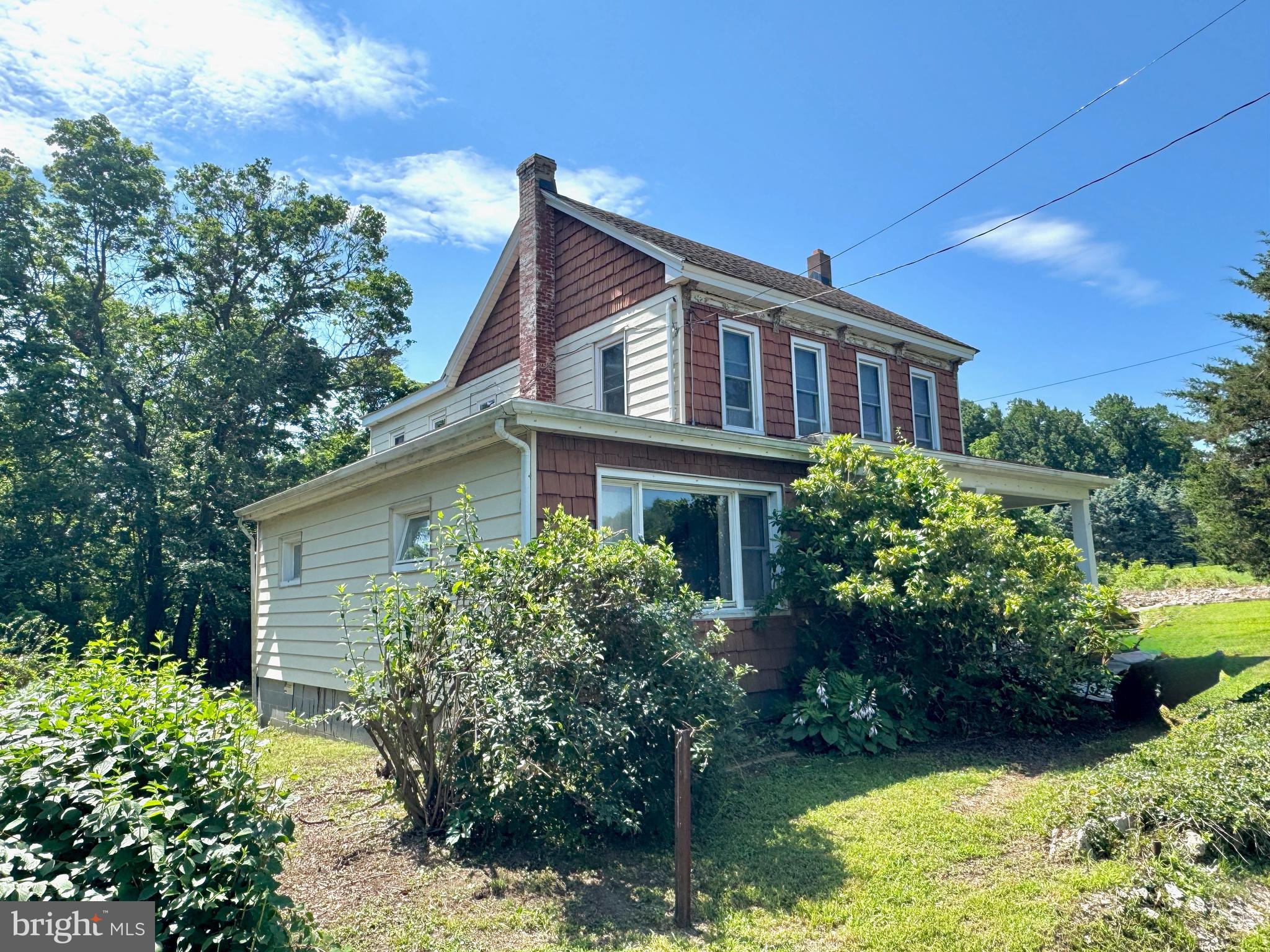 722 Mohns Hill Road Reading, PA 19608 - Photo 32 of 46 a front view of house with yard and green space
