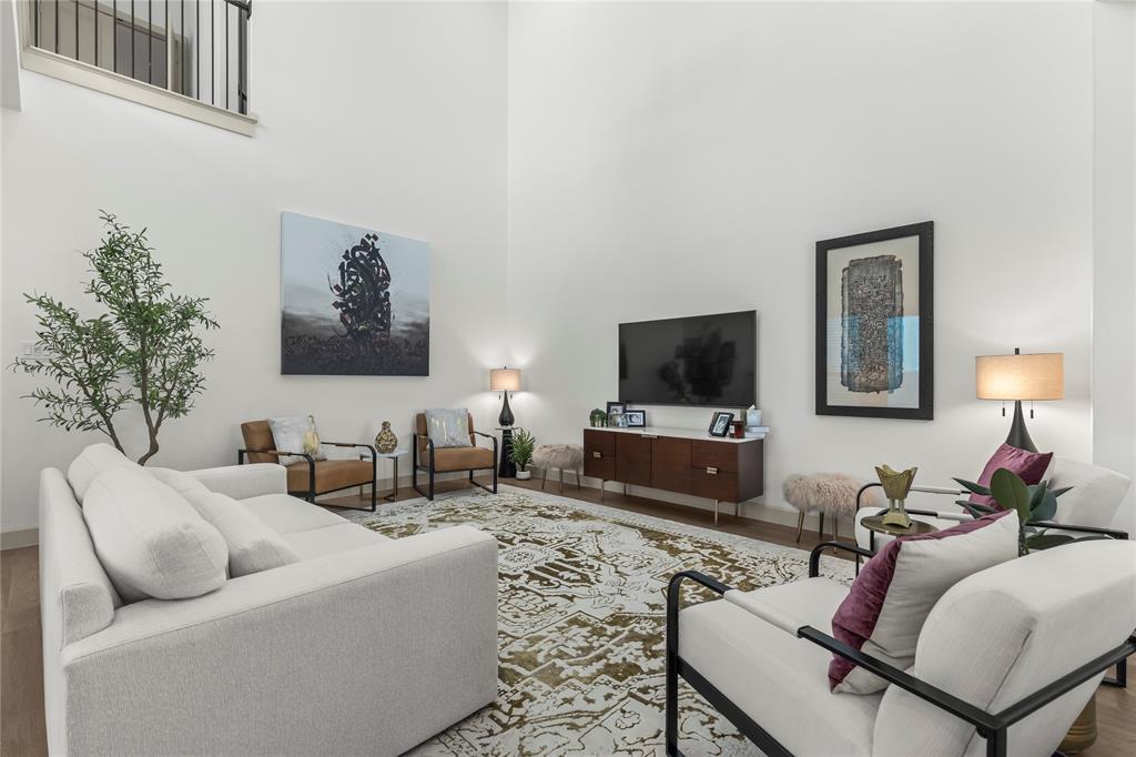 15627 Rue Drive Frisco, TX 75033 - Photo 11 of 35 a living room with furniture and a flat screen tv