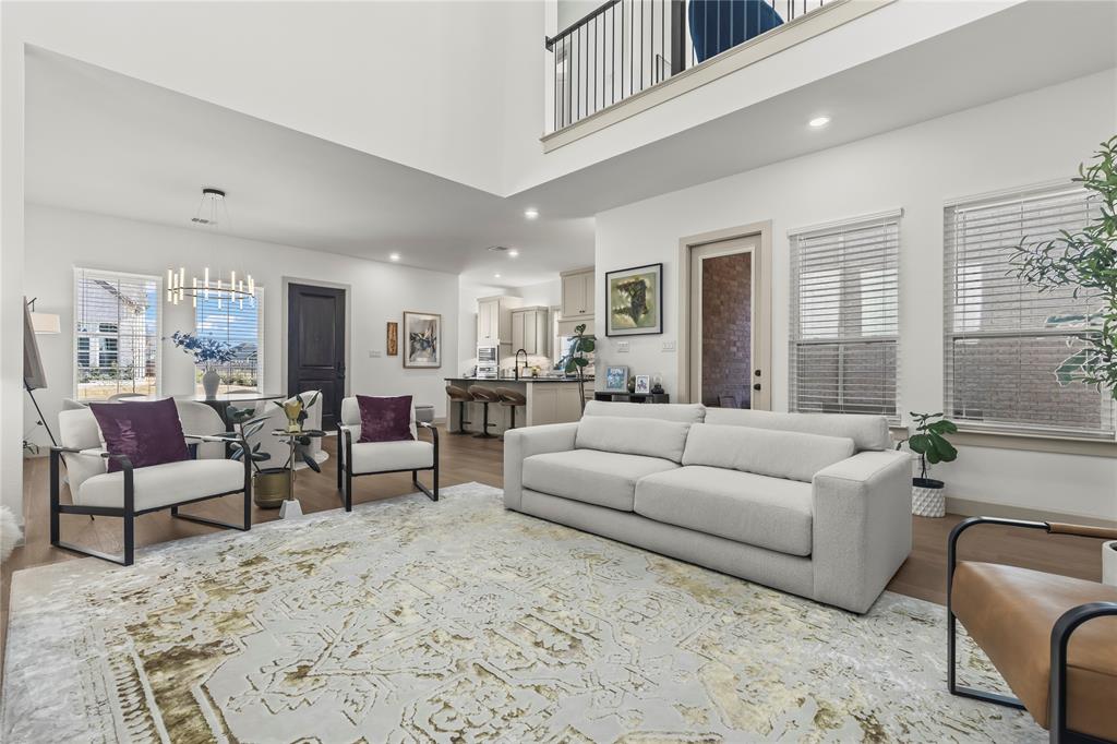 15627 Rue Drive Frisco, TX 75033 - Photo 13 of 35 a living room with furniture and a large window
