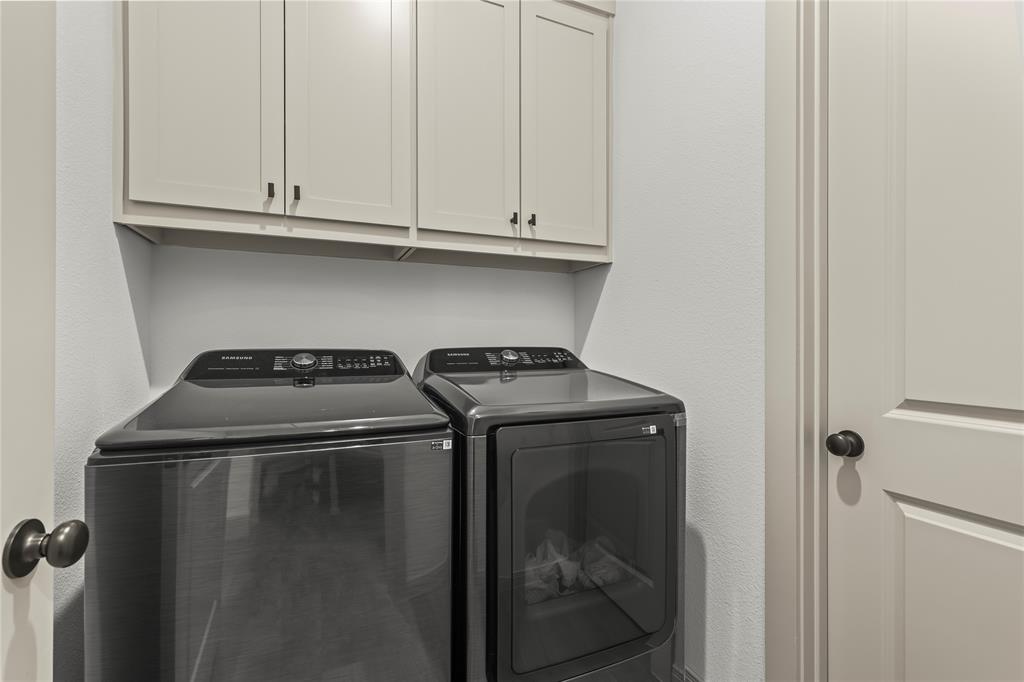 15627 Rue Drive Frisco, TX 75033 - Photo 15 of 35 a utility room with dryer and washer
