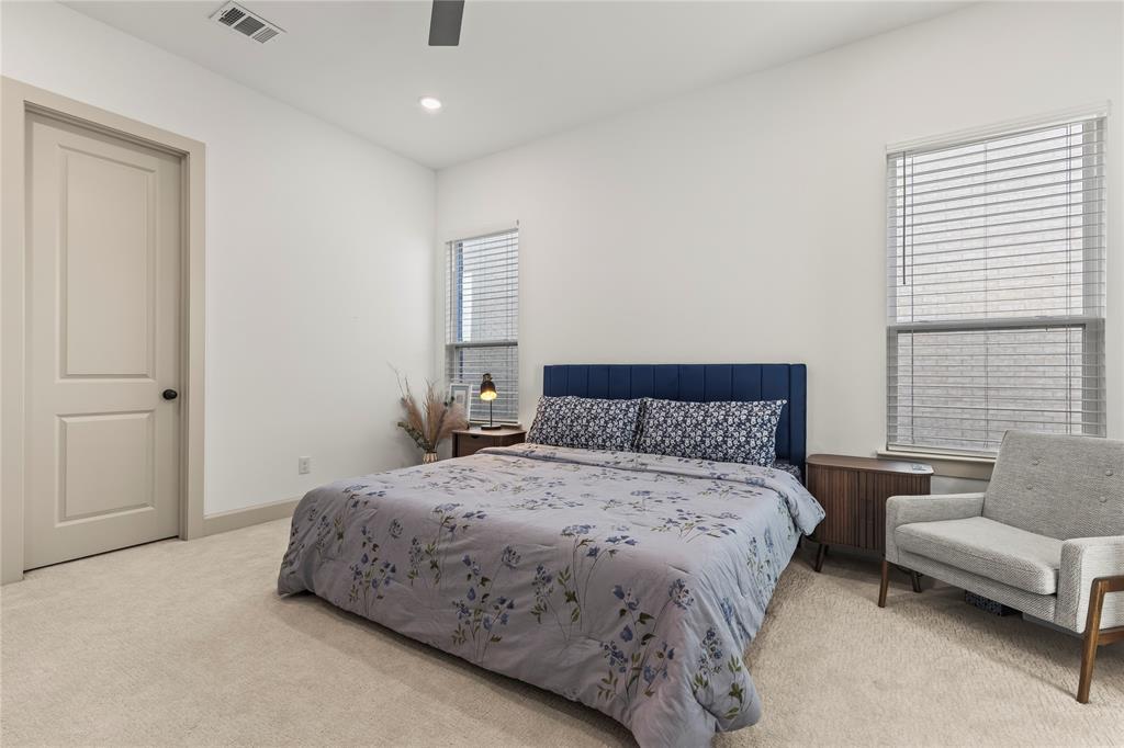 15627 Rue Drive Frisco, TX 75033 - Photo 18 of 35 a bedroom with a bed and a couch