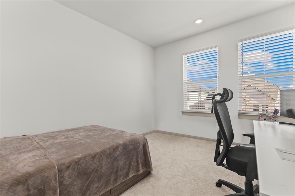 15627 Rue Drive Frisco, TX 75033 - Photo 30 of 35 a bedroom with a bed and a window