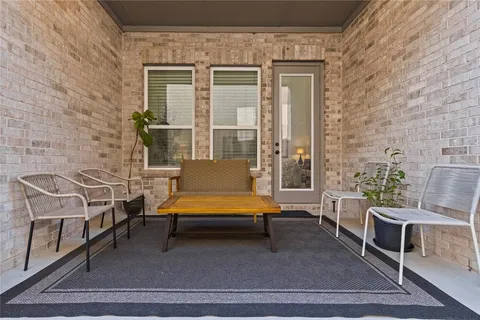 a backyard of a house with seating space