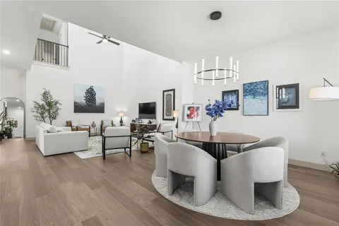 a living room with fireplace furniture and a flat screen tv
