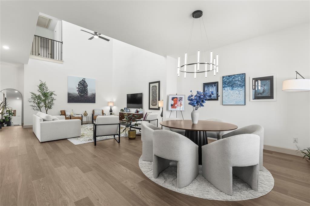 15627 Rue Drive Frisco, TX 75033 - Photo 10 of 35 a living room with fireplace furniture and a flat screen tv
