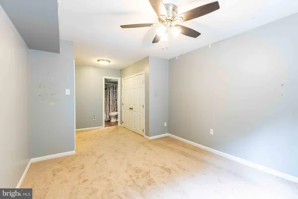 a view of a big room with carpet