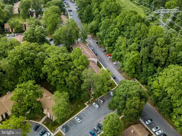 an aerial view of house with yard