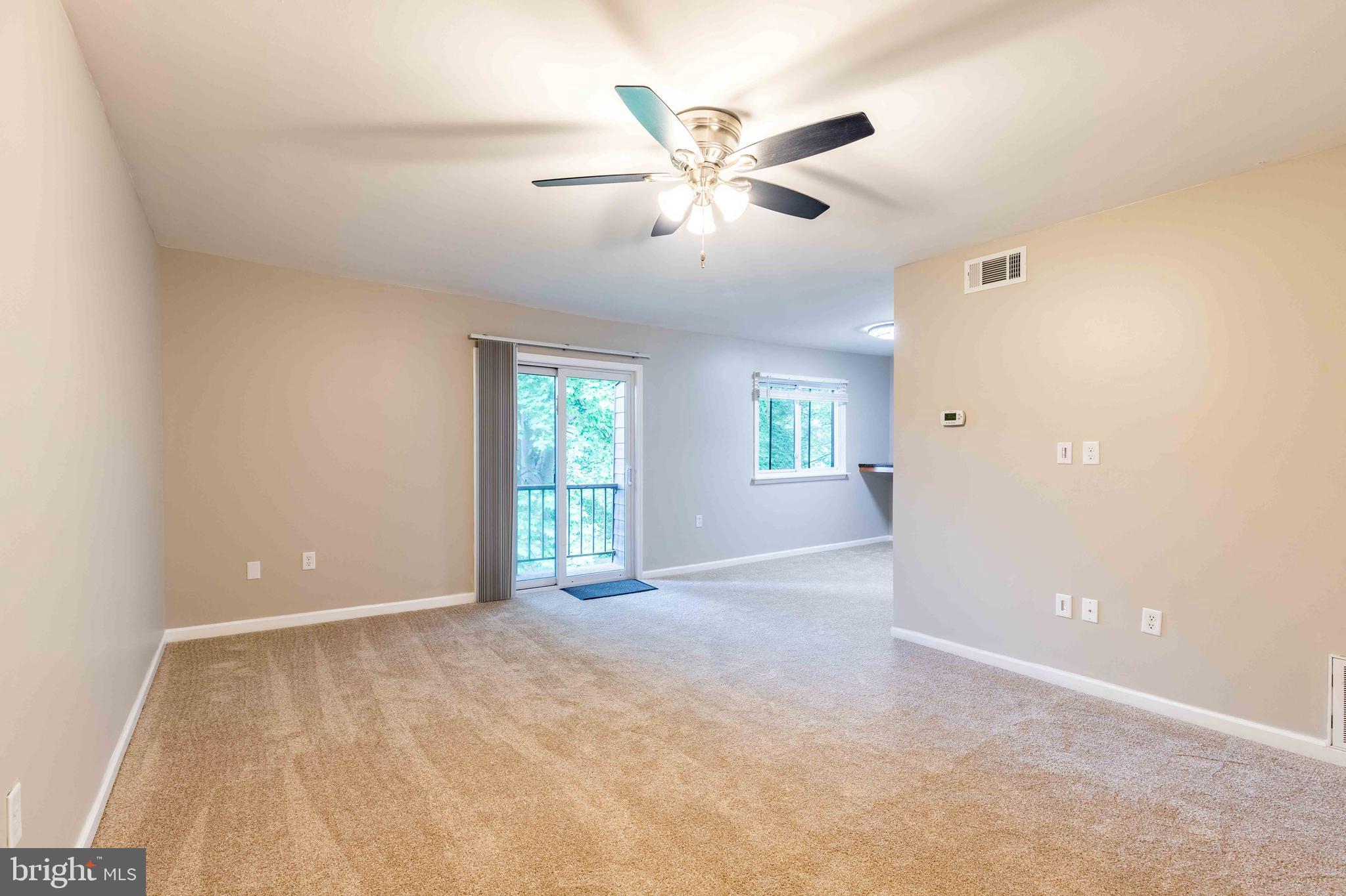 704 Painters Crossing, Unit 704 Chadds Ford, PA 19317 - Photo 7 of 34 a view of an empty room with a window